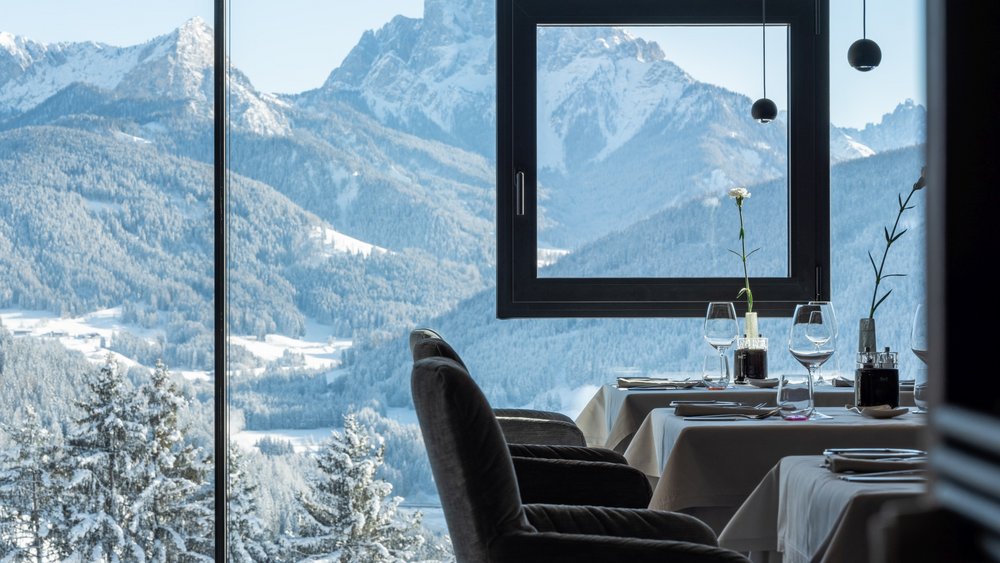 Le foto più belle dell’Alpen Tesitin Ristorante con vista panoramica sulle montagne innevate d'inverno